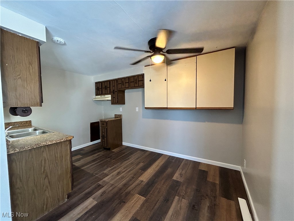 98 View Street, Unit 2 Weirton, WV 26062 - Photo 4 of 10 Kitchen featuring ceiling fan, dark wood finished floors, and light countertops