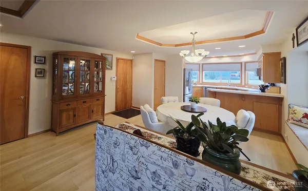 a dining room with furniture and window