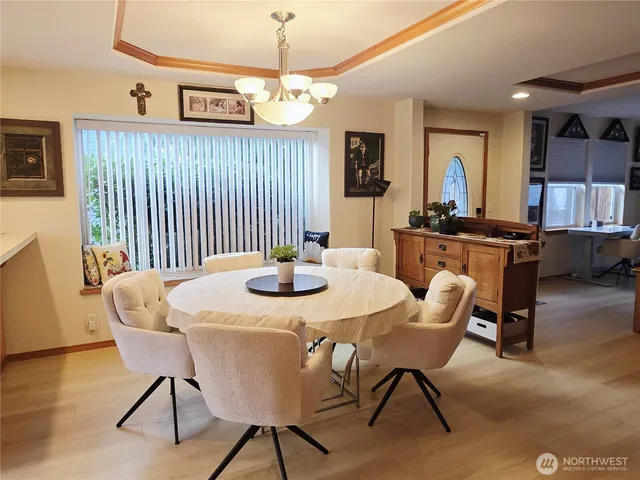a view of a dining room with furniture