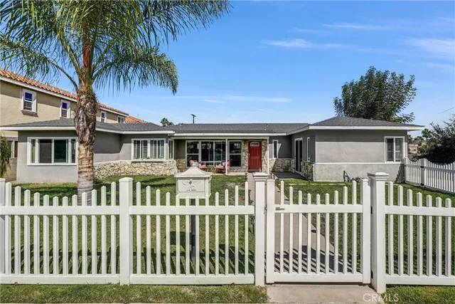 a front view of a house with a porch