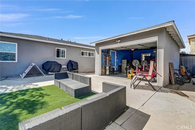 a bathroom with a toilet sink and shower
