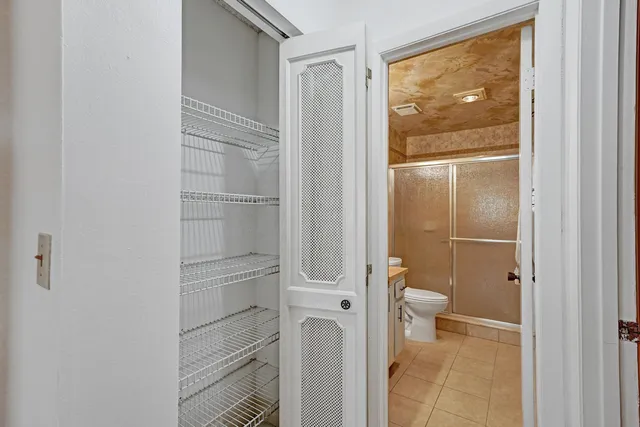 a view of backyard with large tree