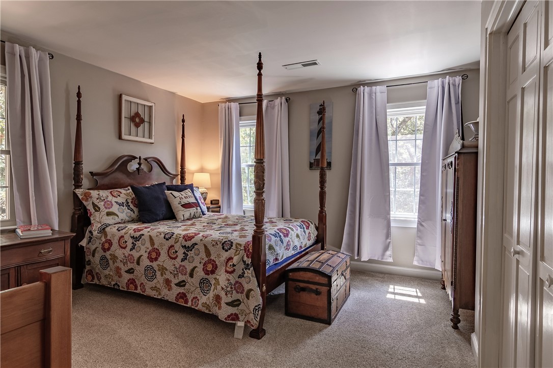 620 Seminole Point Road Fair Play, SC 29643 - Photo 28 of 50 Multiple windows draw ample natural light across this bedroom