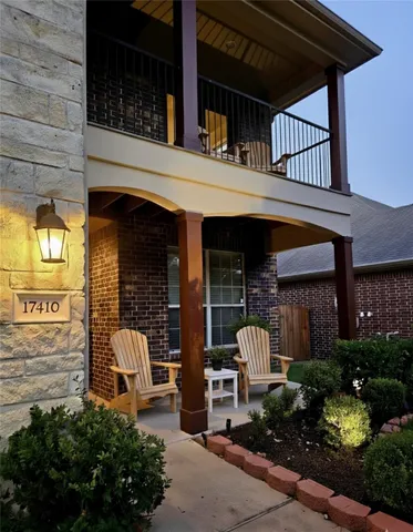 a front view of a building with garden