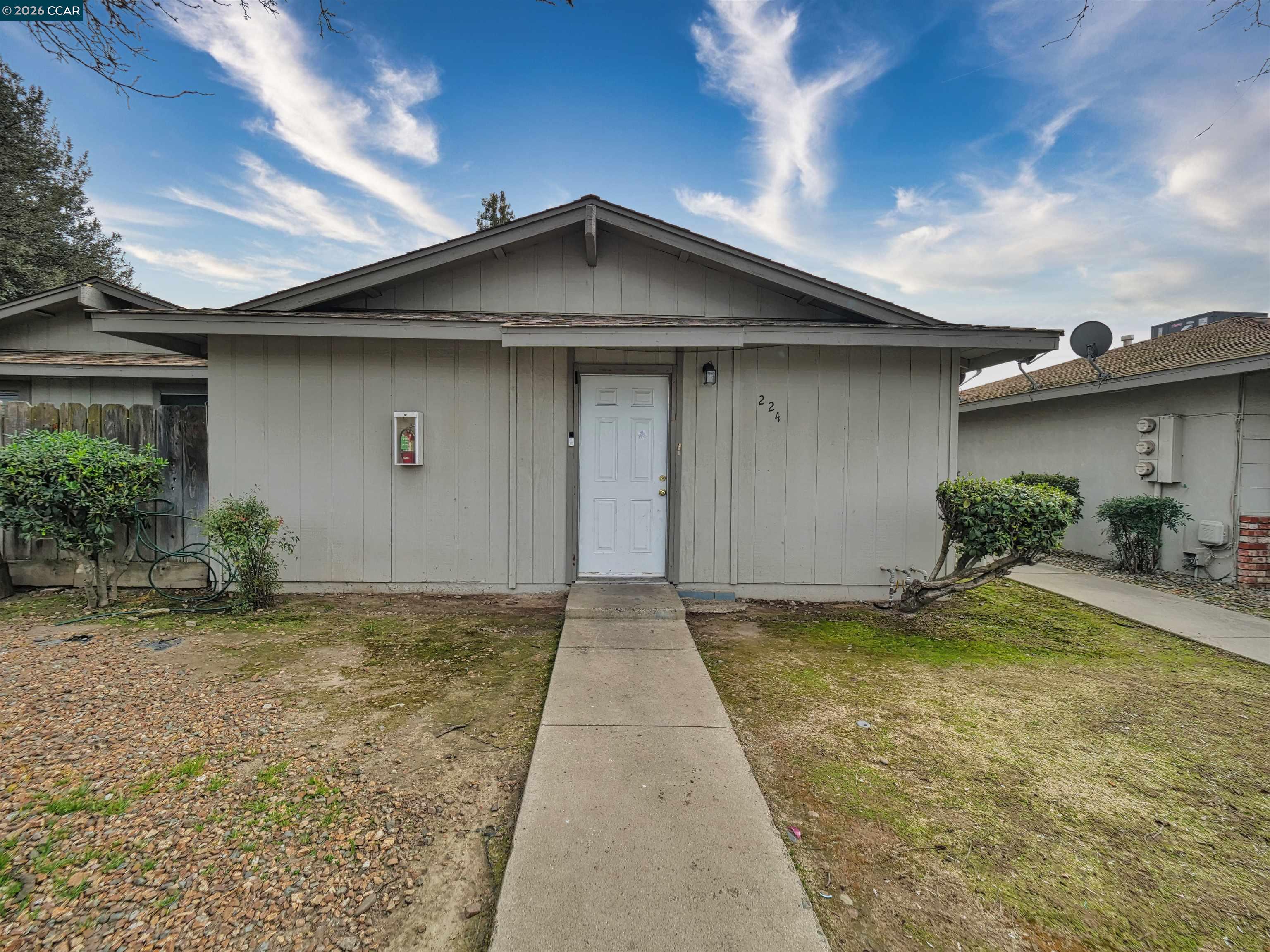 2508 Haddon Avenue Modesto, CA 95354 - Photo 12 of 20 a view of a house with a yard