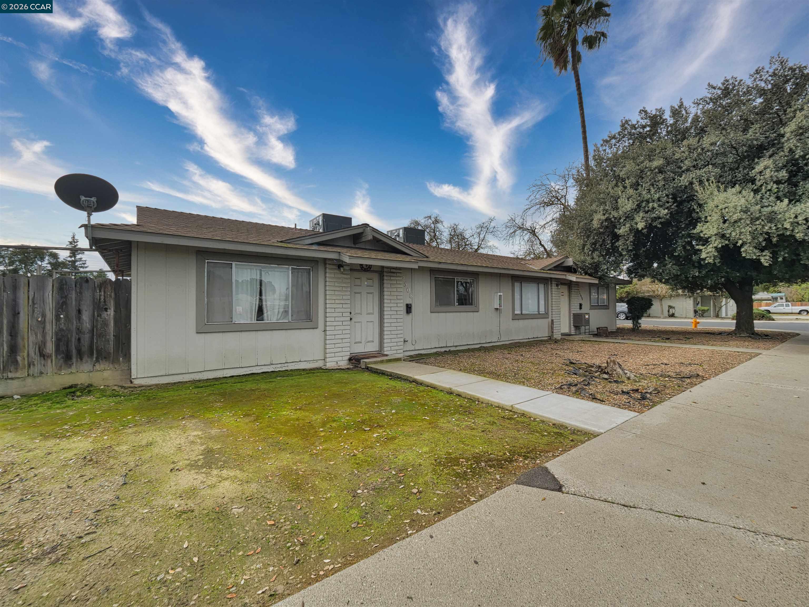 2508 Haddon Avenue Modesto, CA 95354 - Photo 4 of 20 a view of a house with a swimming pool