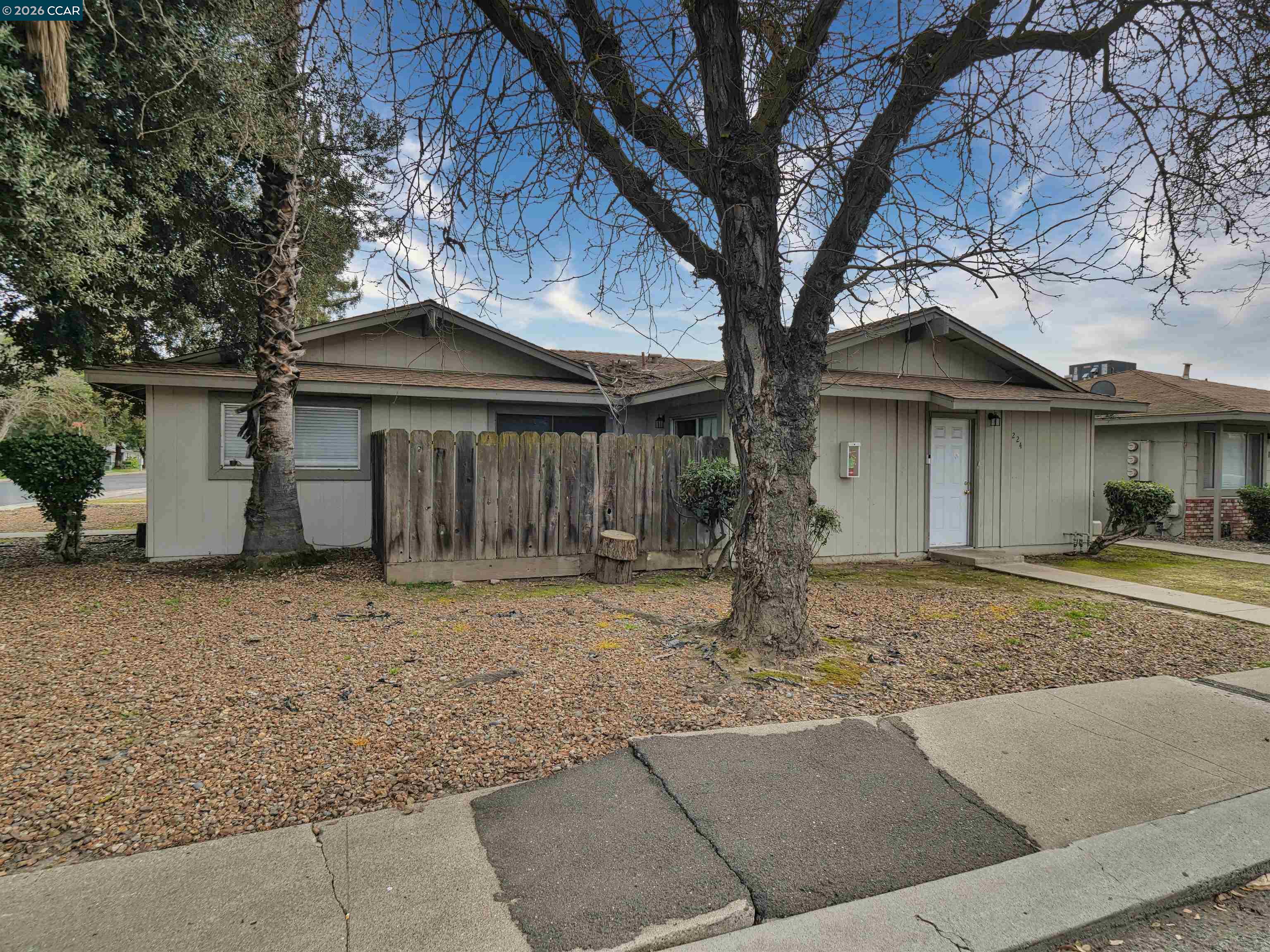 2508 Haddon Avenue Modesto, CA 95354 - Photo 8 of 20 a front view of a house with garden
