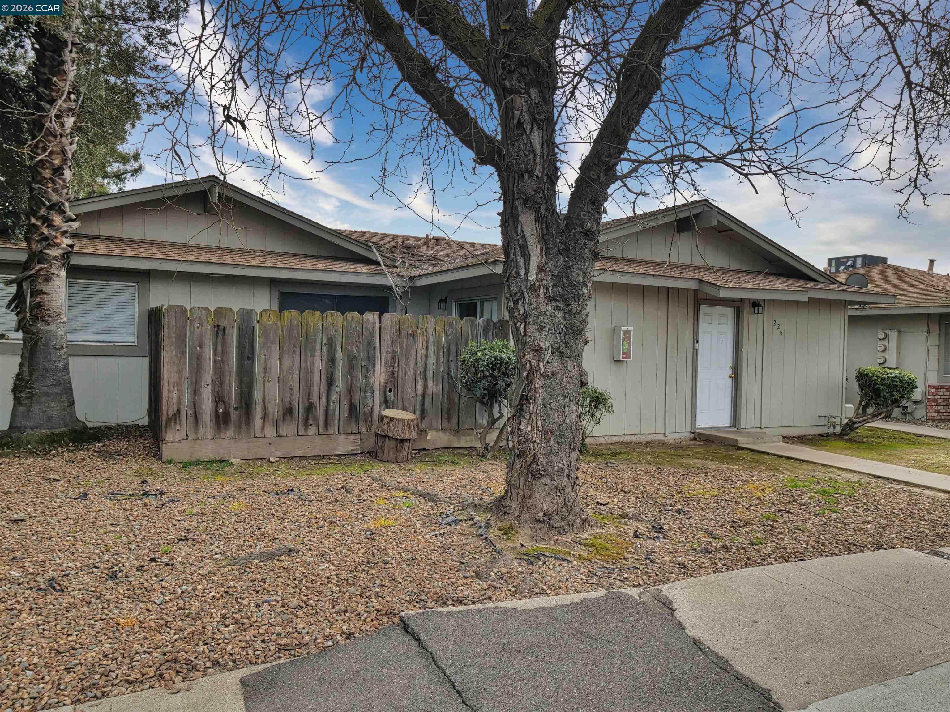 2508 Haddon Avenue Modesto, CA 95354 - Photo 9 of 20 a house with trees in the background