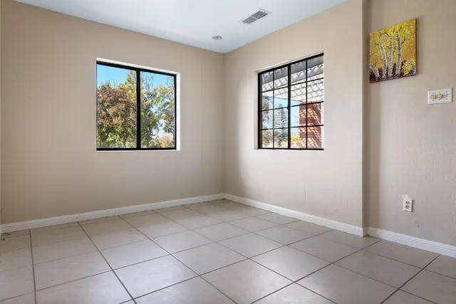 a view of an empty room and window