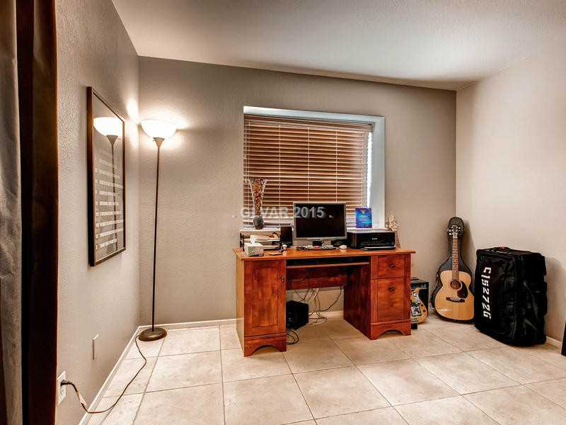 3 Barton Spring Circle Henderson, NV 89074 - Photo 10 of 15 Bedroom. Spacious secondary bedroom with tile floor