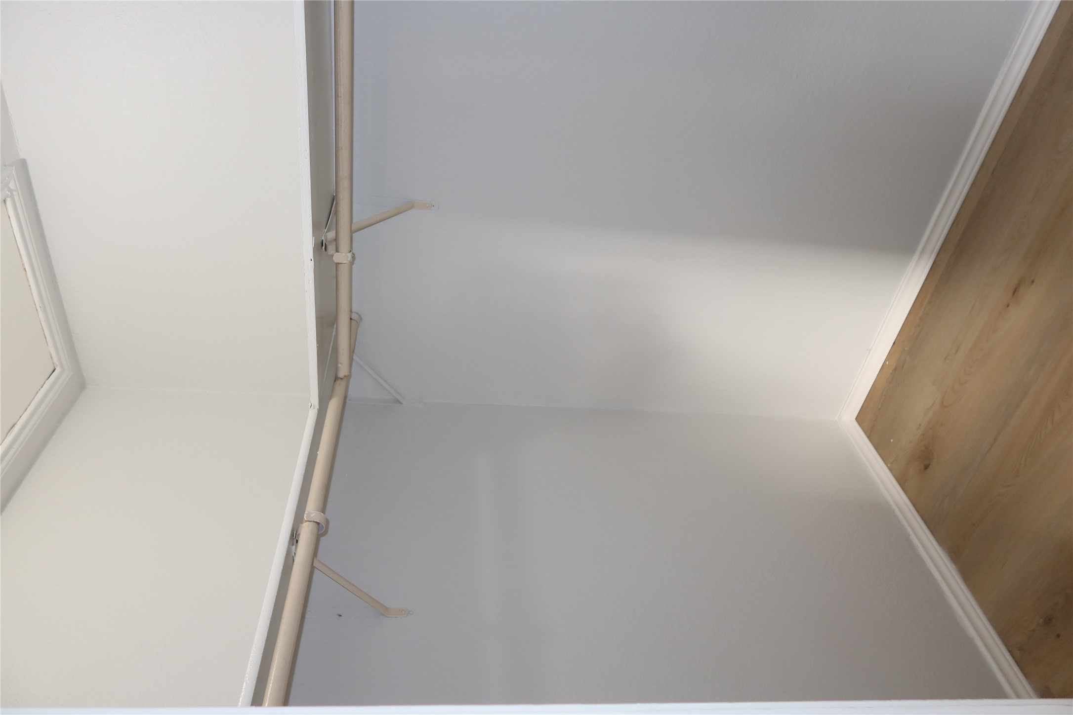 2511 Bucks Run, Unit A Austin, TX 78744 - Photo 13 of 25 Walk in closet featuring light wood-style floors