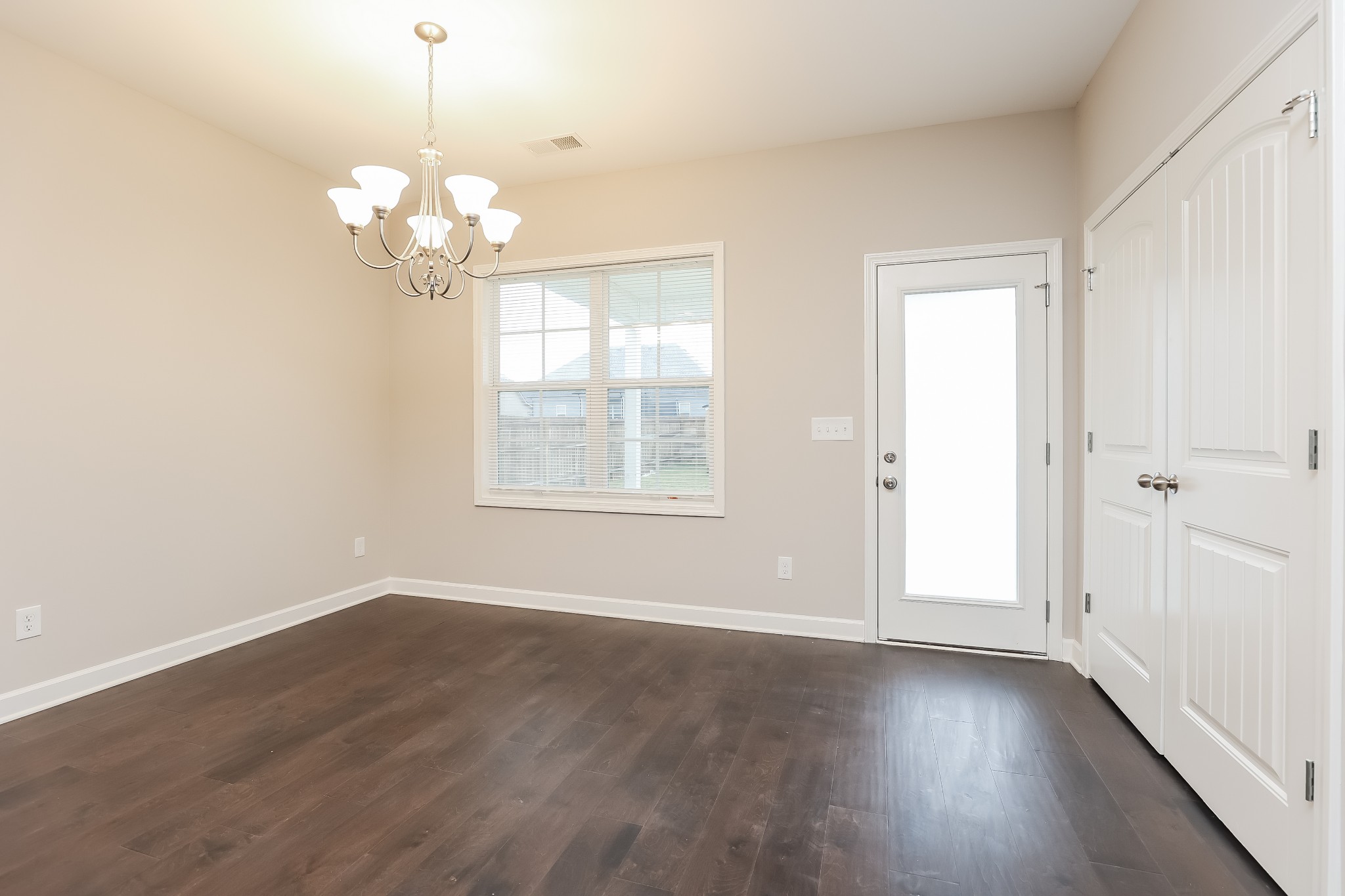 311 Bountiful Smyrna, TN 37167 - Photo 14 of 15 an empty room with wooden floor and windows