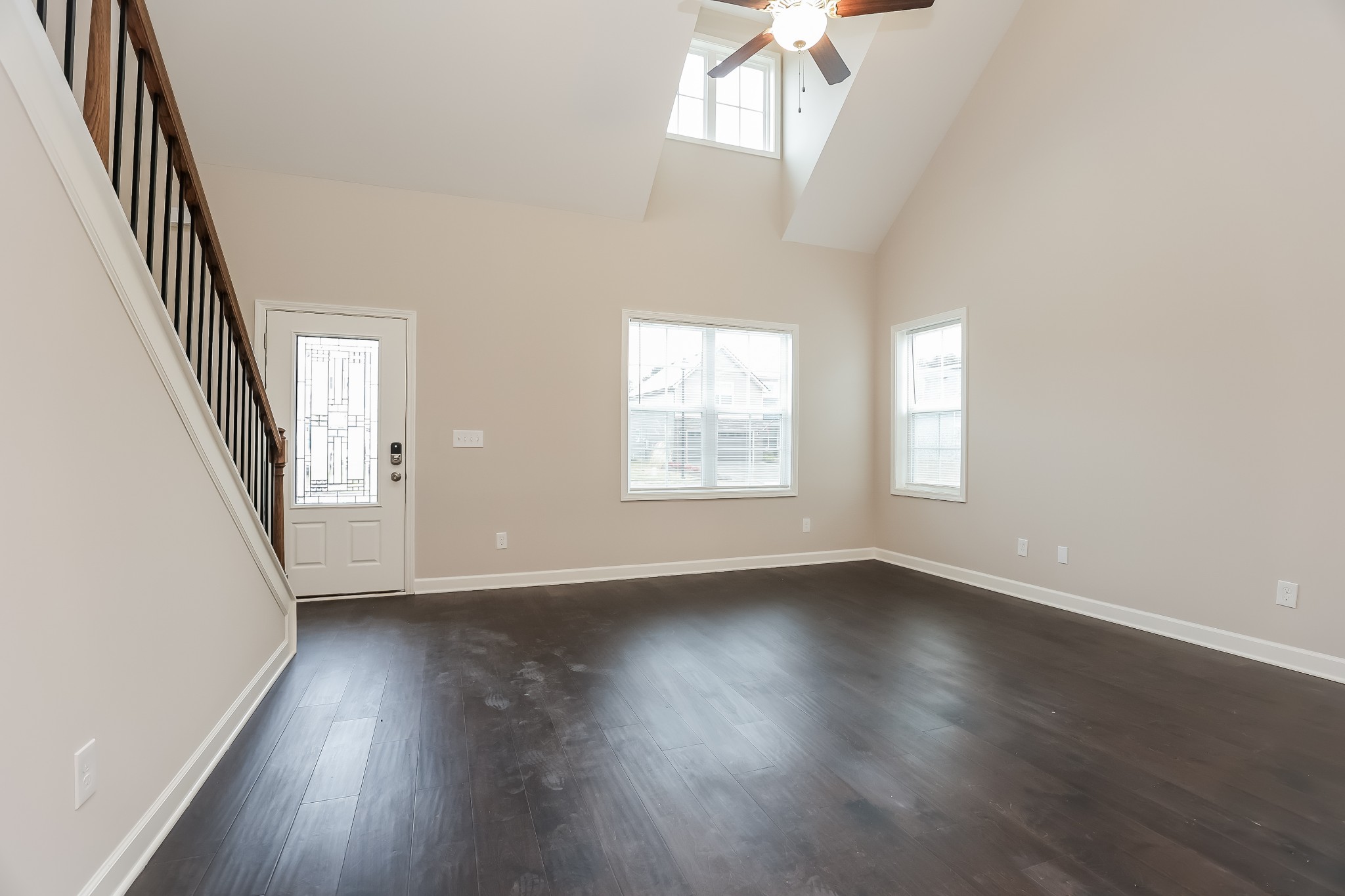 311 Bountiful Smyrna, TN 37167 - Photo 5 of 15 an empty room with wooden floor and windows