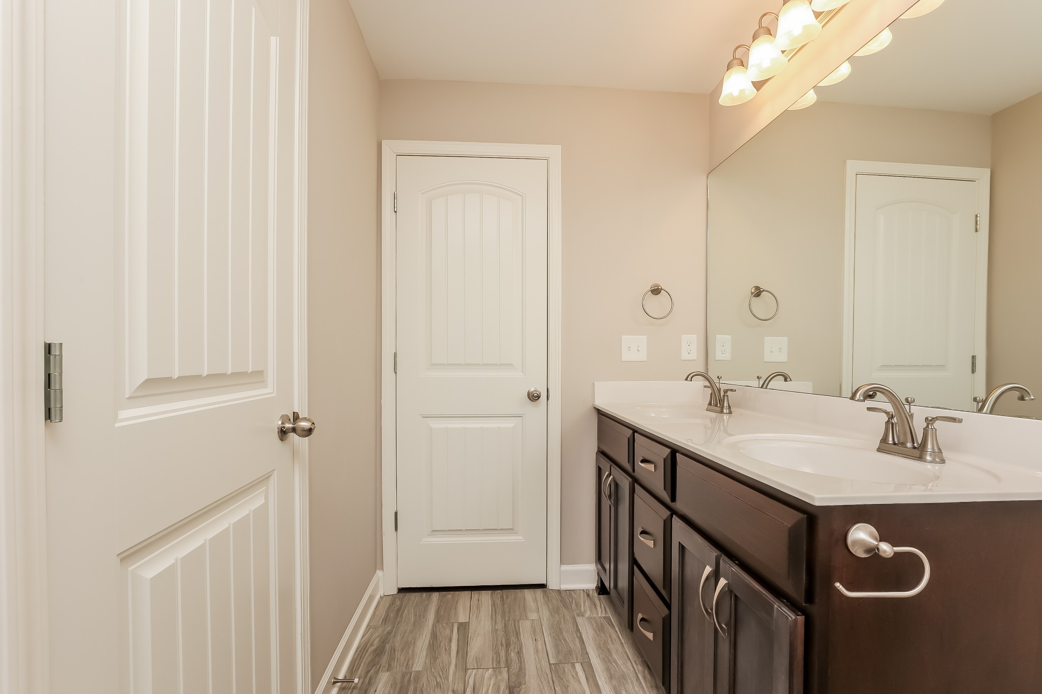 311 Bountiful Smyrna, TN 37167 - Photo 10 of 15 a bathroom with a sink a mirror and a shower