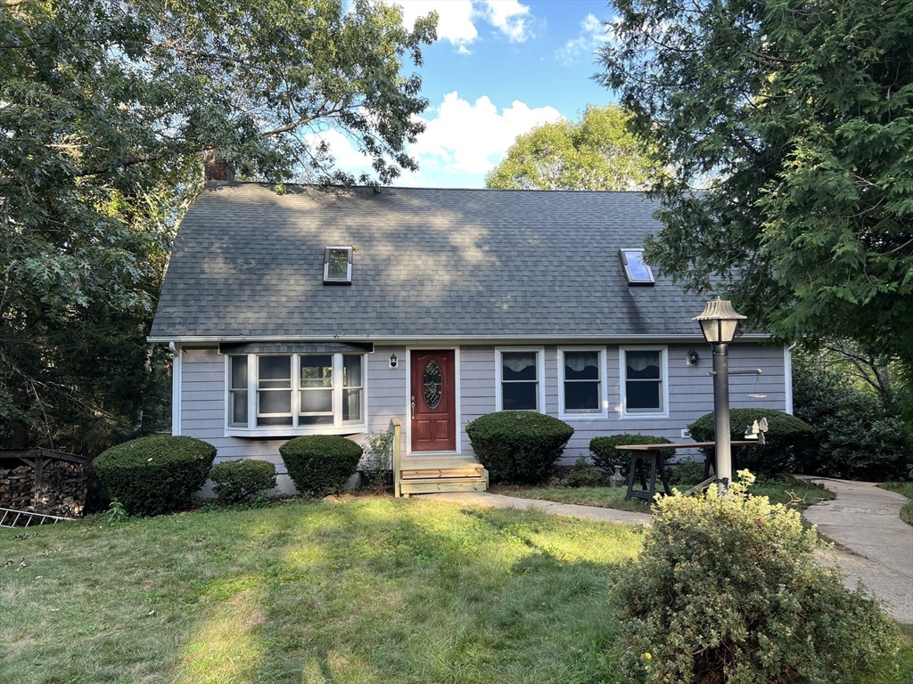 221 Pierce Road West Brookfield, MA 01585 - Photo 2 of 26 a view of a house with a yard and potted plants