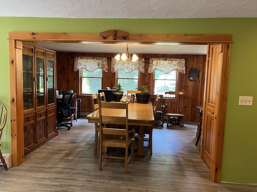 221 Pierce Road West Brookfield, MA 01585 - Photo 23 of 26 a view of a dining room with furniture window and wooden floor