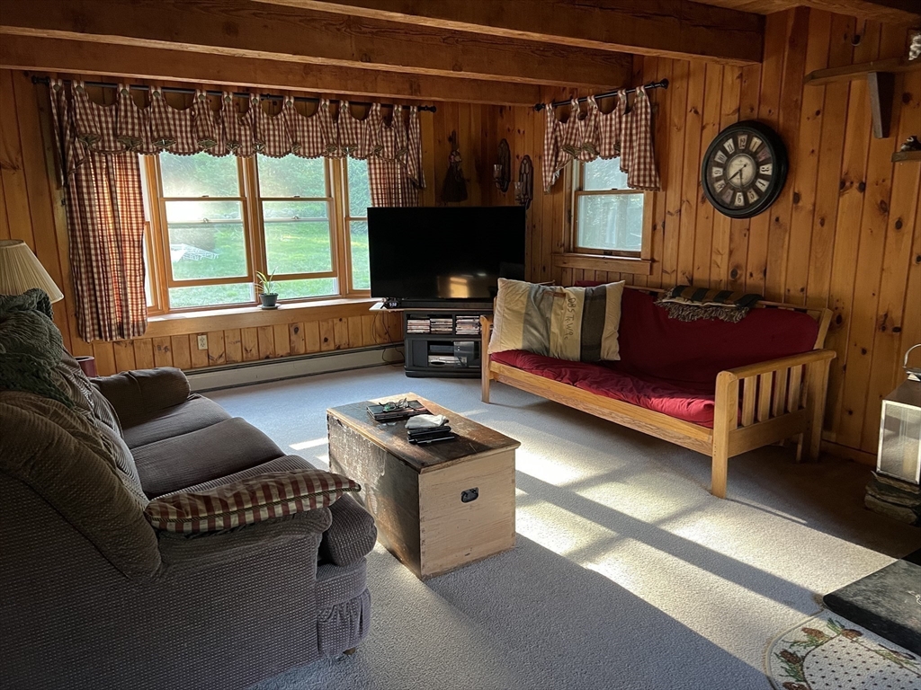 221 Pierce Road West Brookfield, MA 01585 - Photo 5 of 26 a living room with furniture and a large window