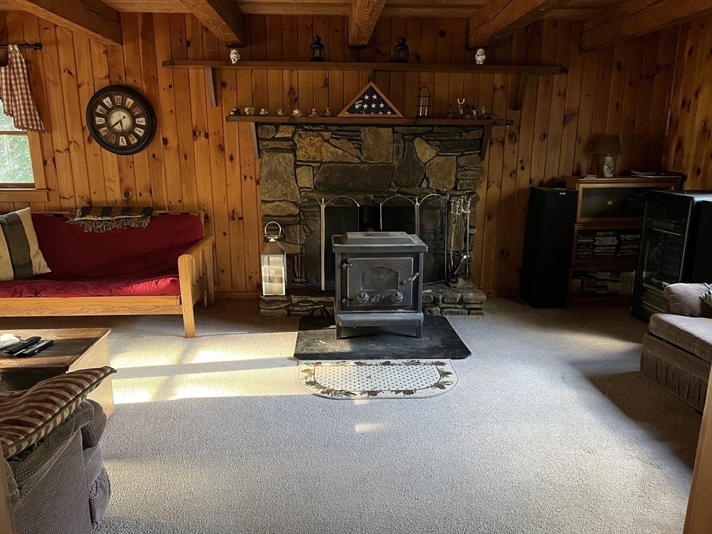 221 Pierce Road West Brookfield, MA 01585 - Photo 7 of 26 a living room with furniture and a fireplace