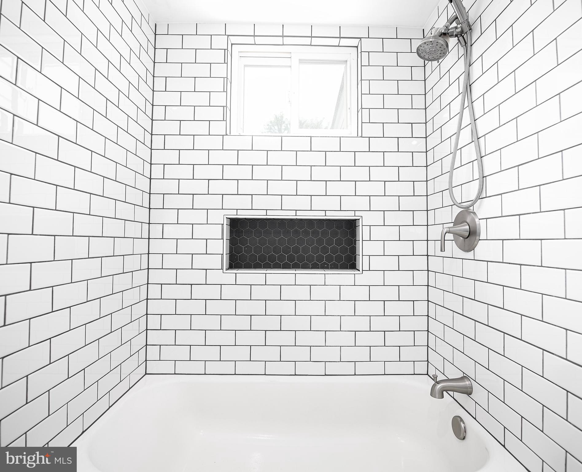 7616 Maple Road Dundalk, MD 21222 - Photo 16 of 35 Tile surround tub/shower combo.