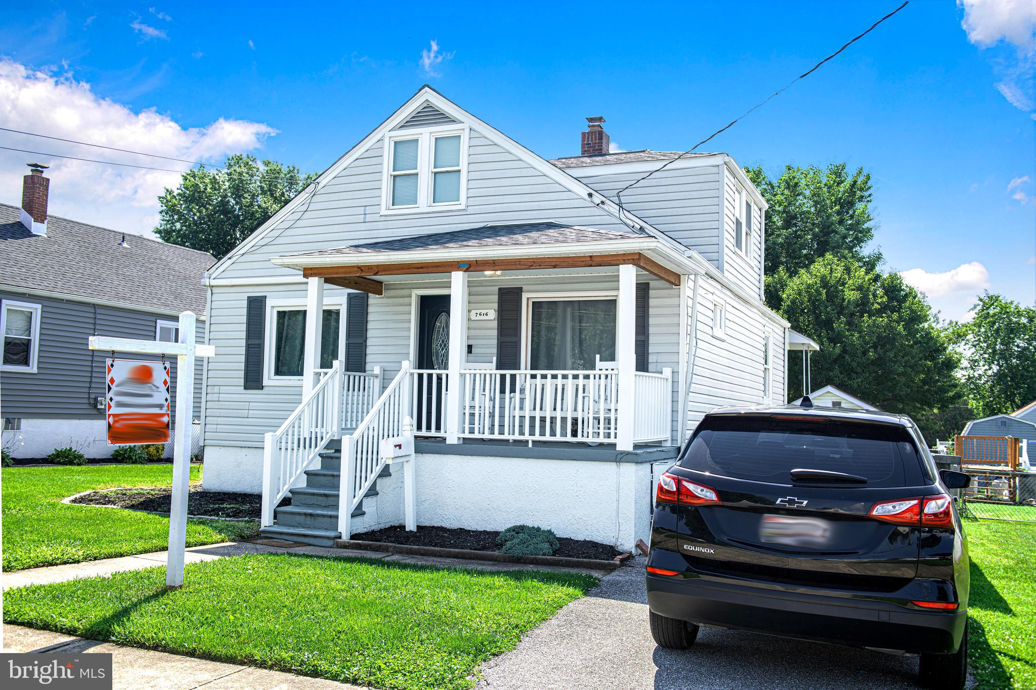 7616 Maple Road Dundalk, MD 21222 - Photo 2 of 35 Porch front with off street parking.