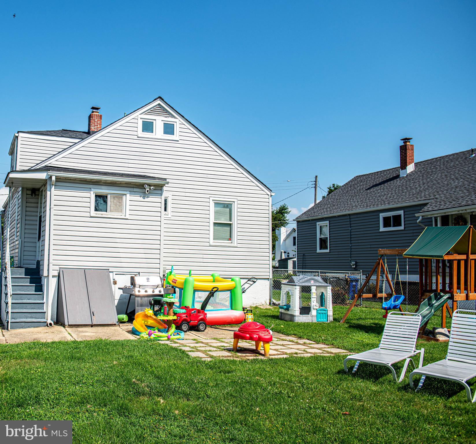 7616 Maple Road Dundalk, MD 21222 - Photo 30 of 35 Patio area for sitting & grassy area for play