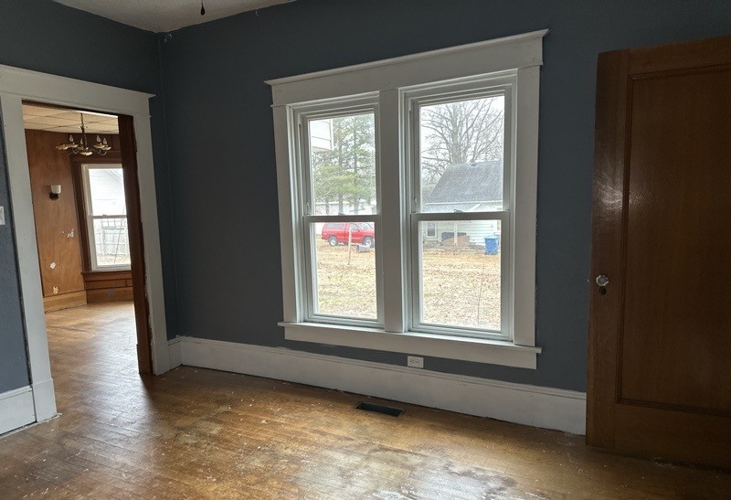 411 South Dean Street Royalton, IL 62983 - Photo 18 of 18 a view of an empty room with wooden floor and a window