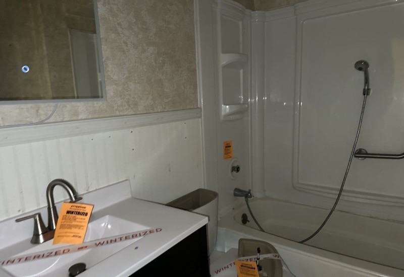 411 South Dean Street Royalton, IL 62983 - Photo 10 of 18 a bathroom with a sink and washing machine