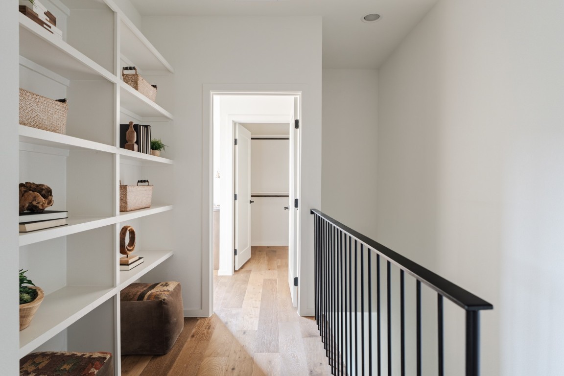 3500 Pecan Springs Road, Unit 5 Austin, TX 78723 - Photo 5 of 9 a view of a hallway with closet and wooden floor