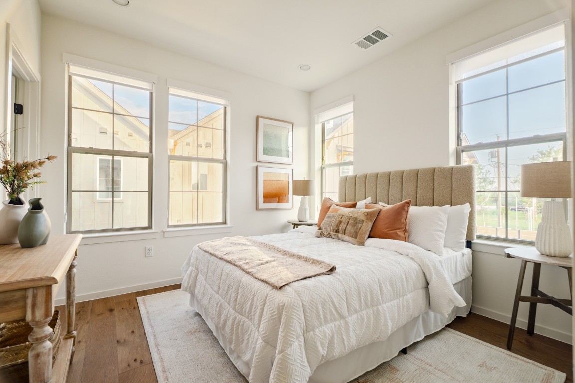 3500 Pecan Springs Road, Unit 5 Austin, TX 78723 - Photo 7 of 9 a bedroom with a bed and a large window