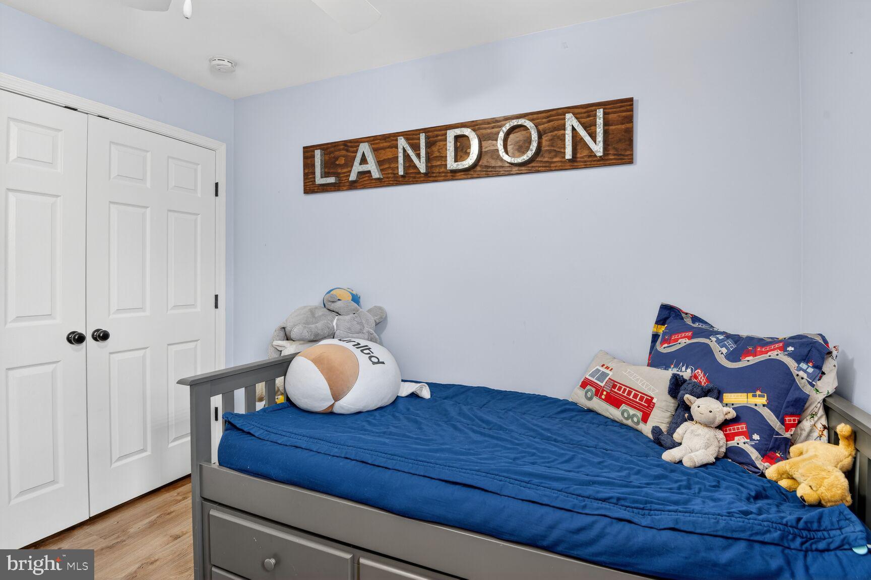 1409 James Way Edgewater, MD 21037 - Photo 11 of 21 a bedroom with a bed and cabinets