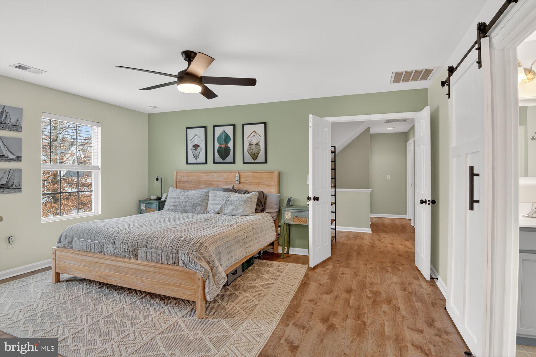 1409 James Way Edgewater, MD 21037 - Photo 13 of 21 a bedroom with a bed and a window