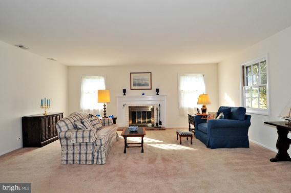 5010 West Running Brook Road Columbia, MD 21044 - Photo 8 of 18 Living Room with Brick, Wood-burning Fireplace