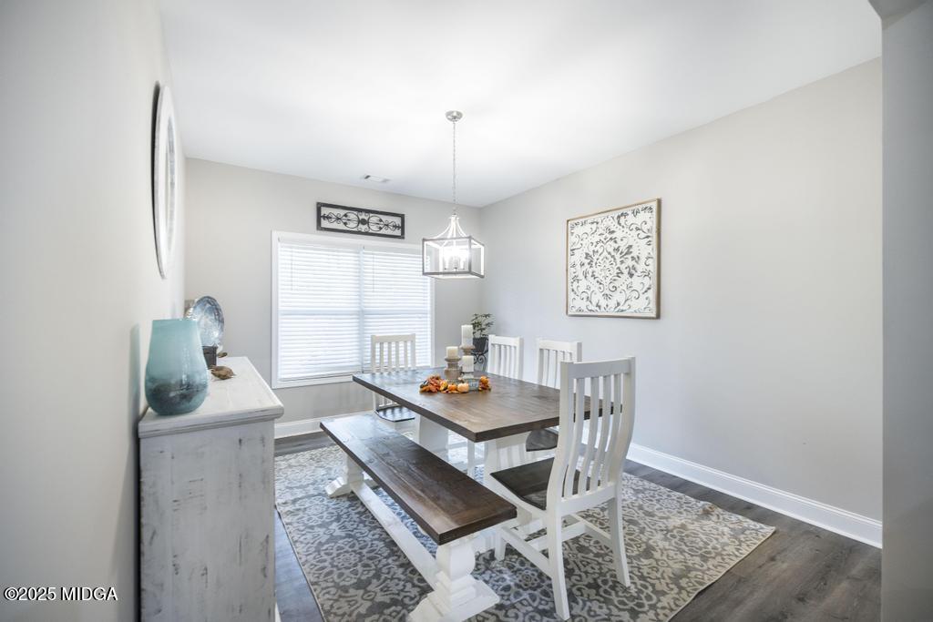 219 Diamond Place Gray, GA 31032 - Photo 12 of 42 a dining room with furniture and window