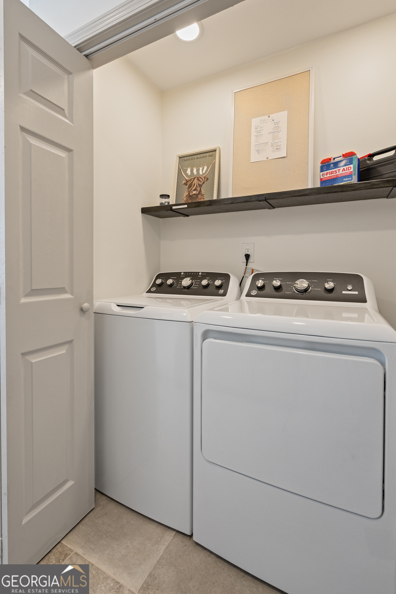 17 North Wesley Ridge Adairsville, GA 30103 - Photo 26 of 30 a utility room with dryer washer and empty racks