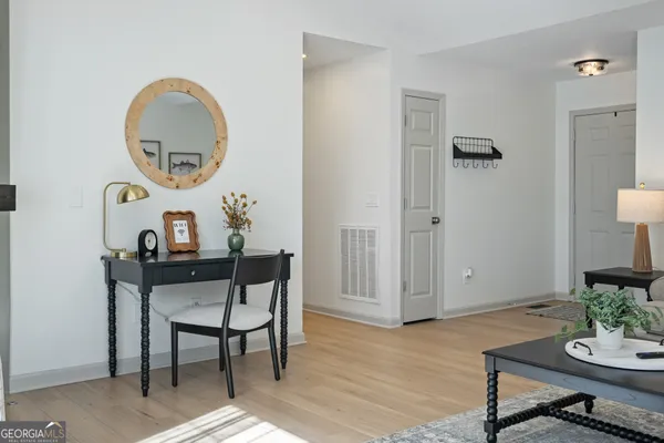 a workspace with furniture and window