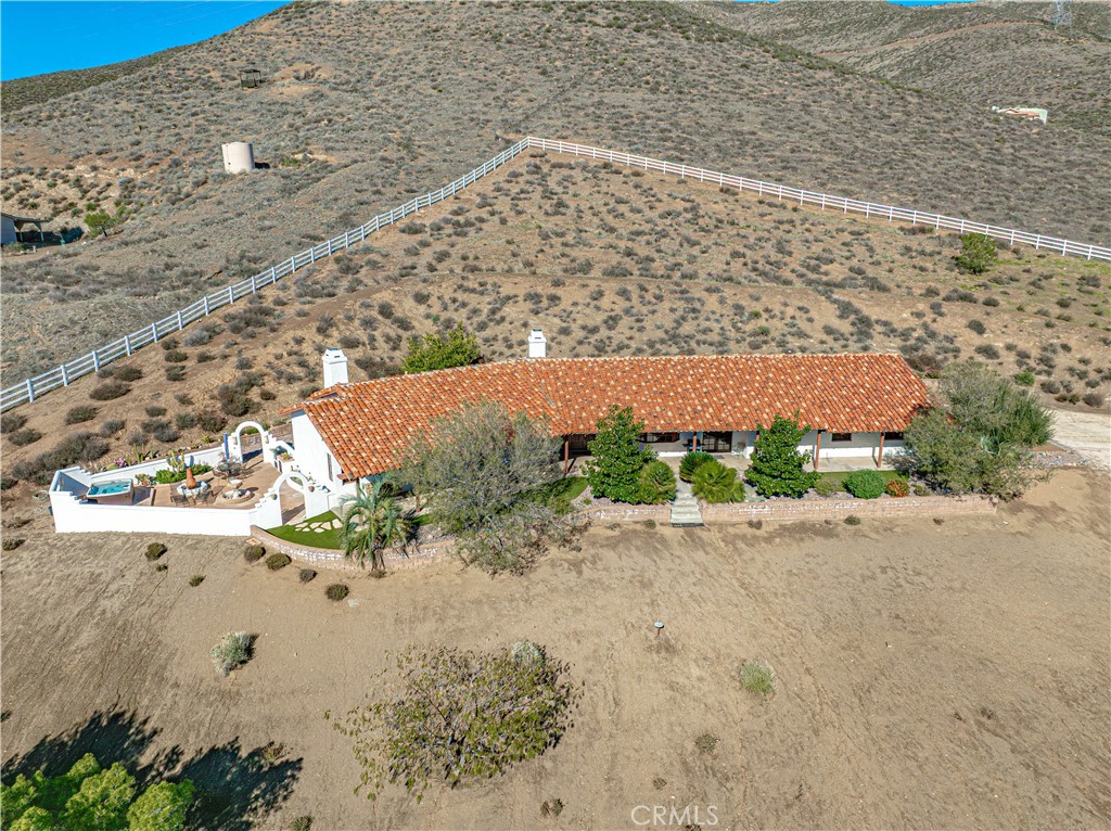 9435 Hierba Road Agua Dulce, CA 91390 - Photo 1 of 1 a view of a road with a building