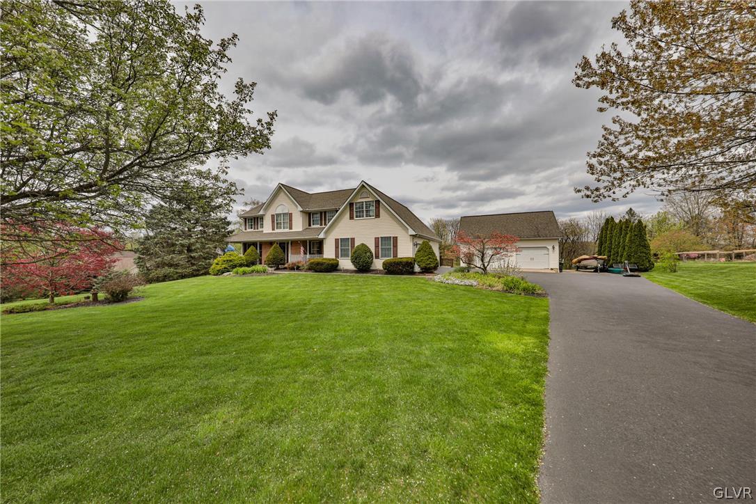 359 Winter Springs Road Nazareth, PA 18064 - Photo 3 of 45 a front view of house with yard and green space