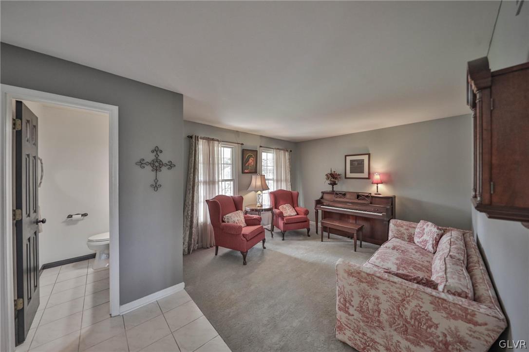 359 Winter Springs Road Nazareth, PA 18064 - Photo 10 of 45 a living room with furniture and a window