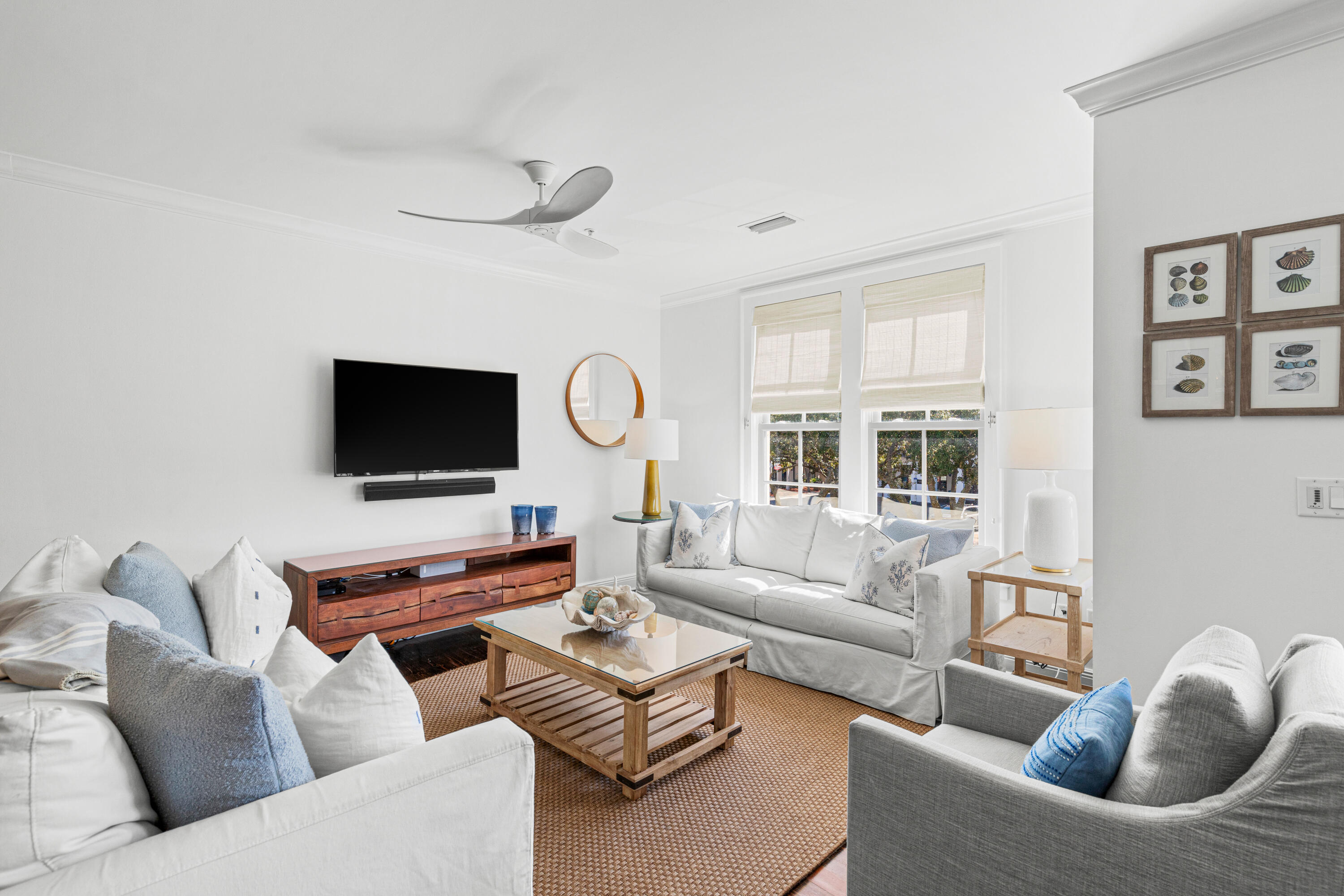 104 North Barrett Square, Unit 2A Inlet Beach, FL 32461 - Photo 12 of 44 a living room with furniture and a flat screen tv
