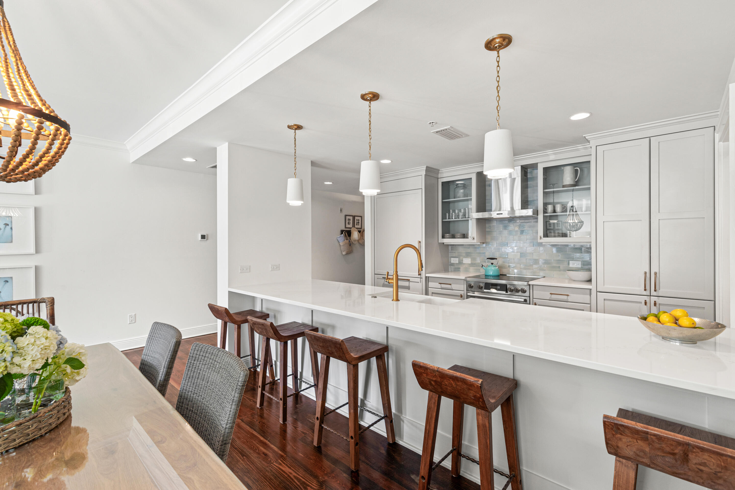 104 North Barrett Square, Unit 2A Inlet Beach, FL 32461 - Photo 15 of 44 a kitchen with granite countertop white cabinets and stainless steel appliances