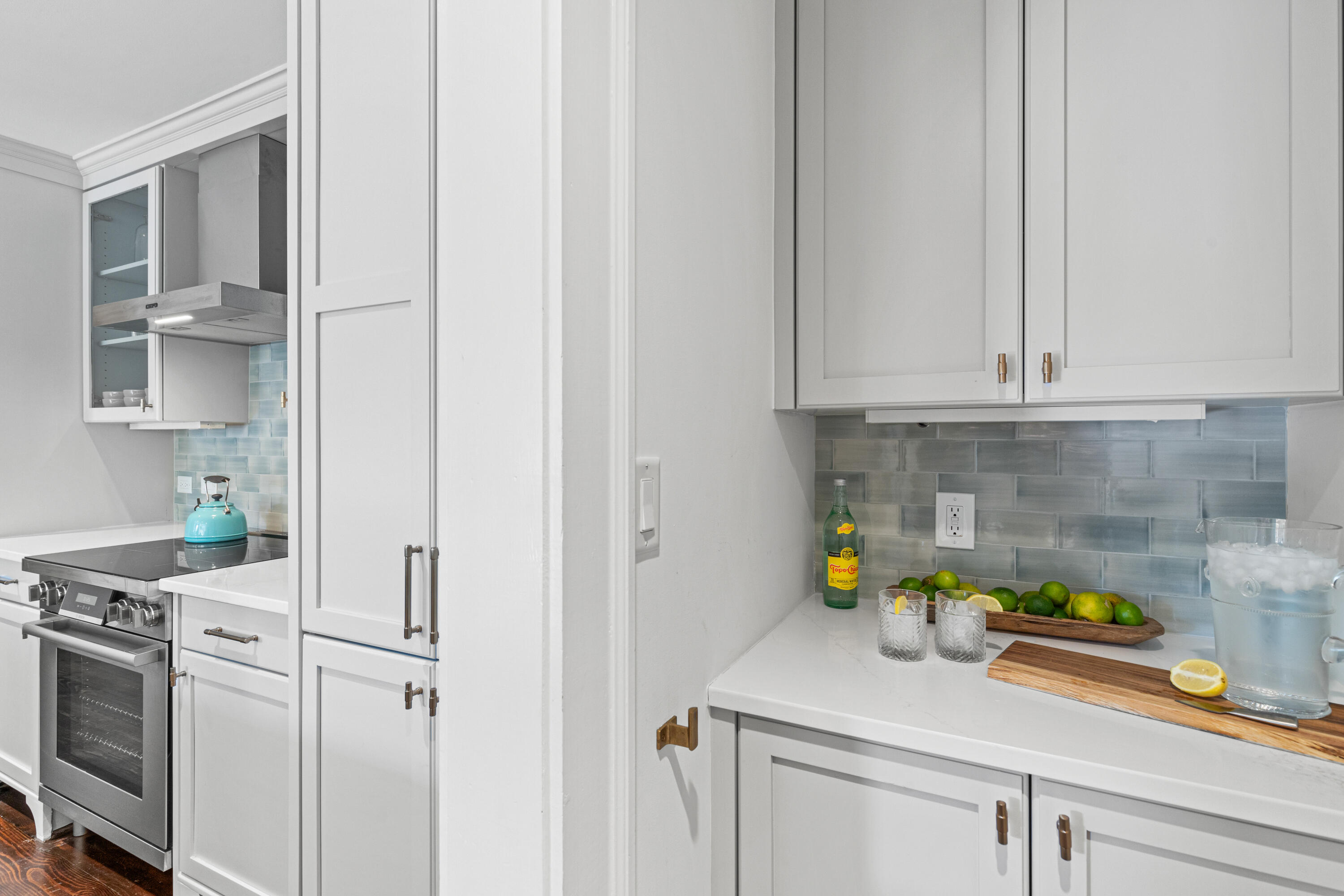 104 North Barrett Square, Unit 2A Inlet Beach, FL 32461 - Photo 20 of 44 a kitchen with a sink and cabinets