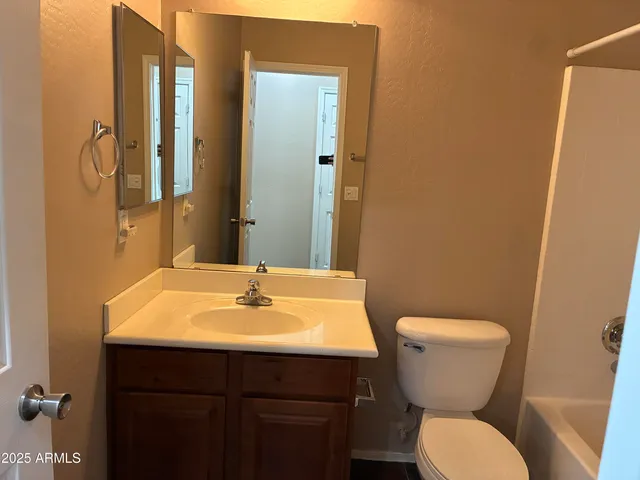 a bathroom with a sink and a toilet