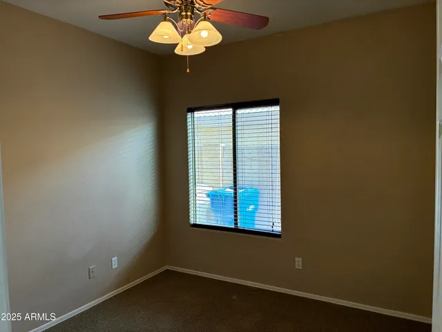 a view of a room with a large window