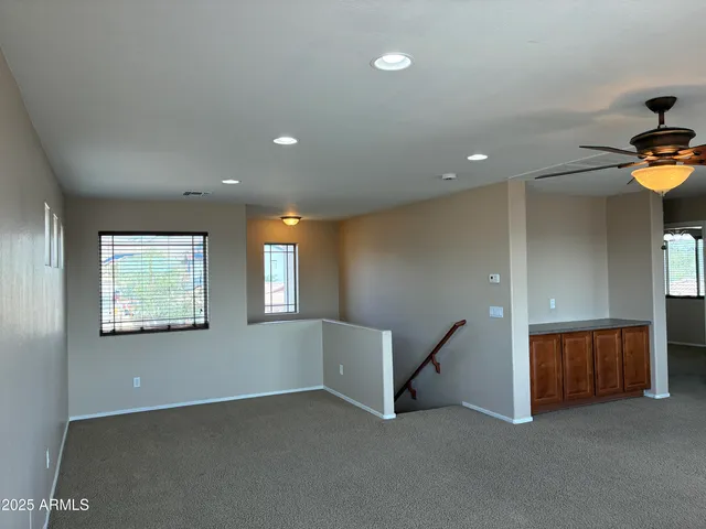 a view of entryway and hall with a window