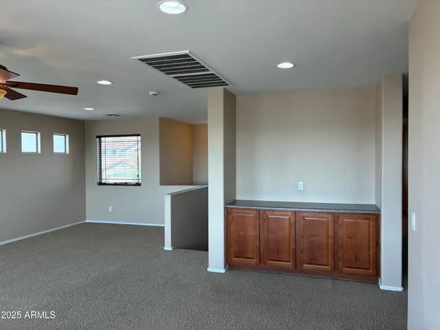 a view of a livingroom from a hallway