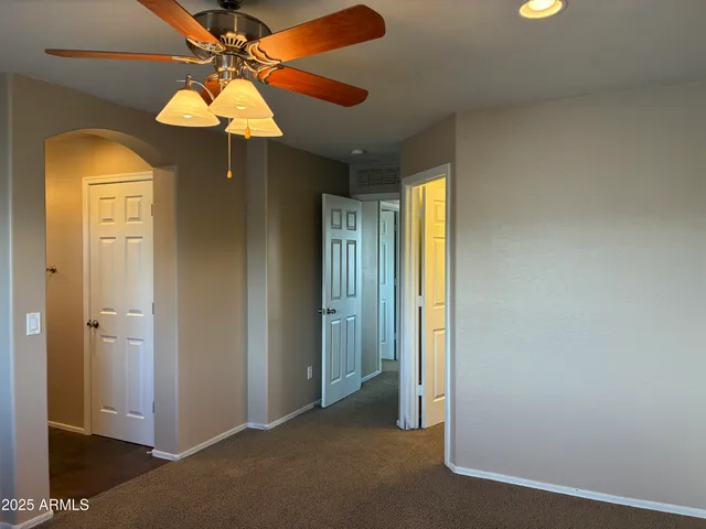 a hallway with an empty room