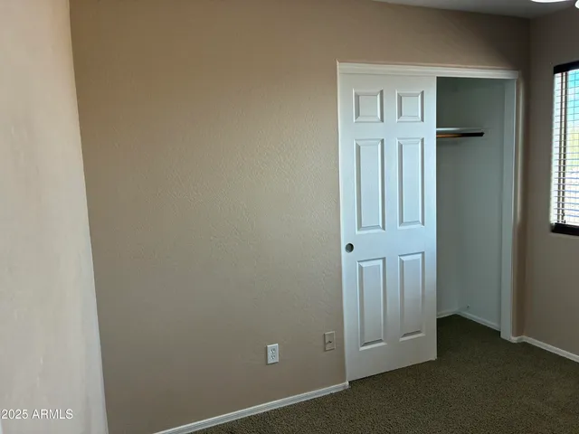 an empty room with a window