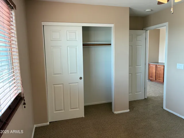 a bathroom with a toilet and a sink