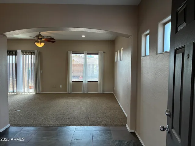 a view of a hallway with a window