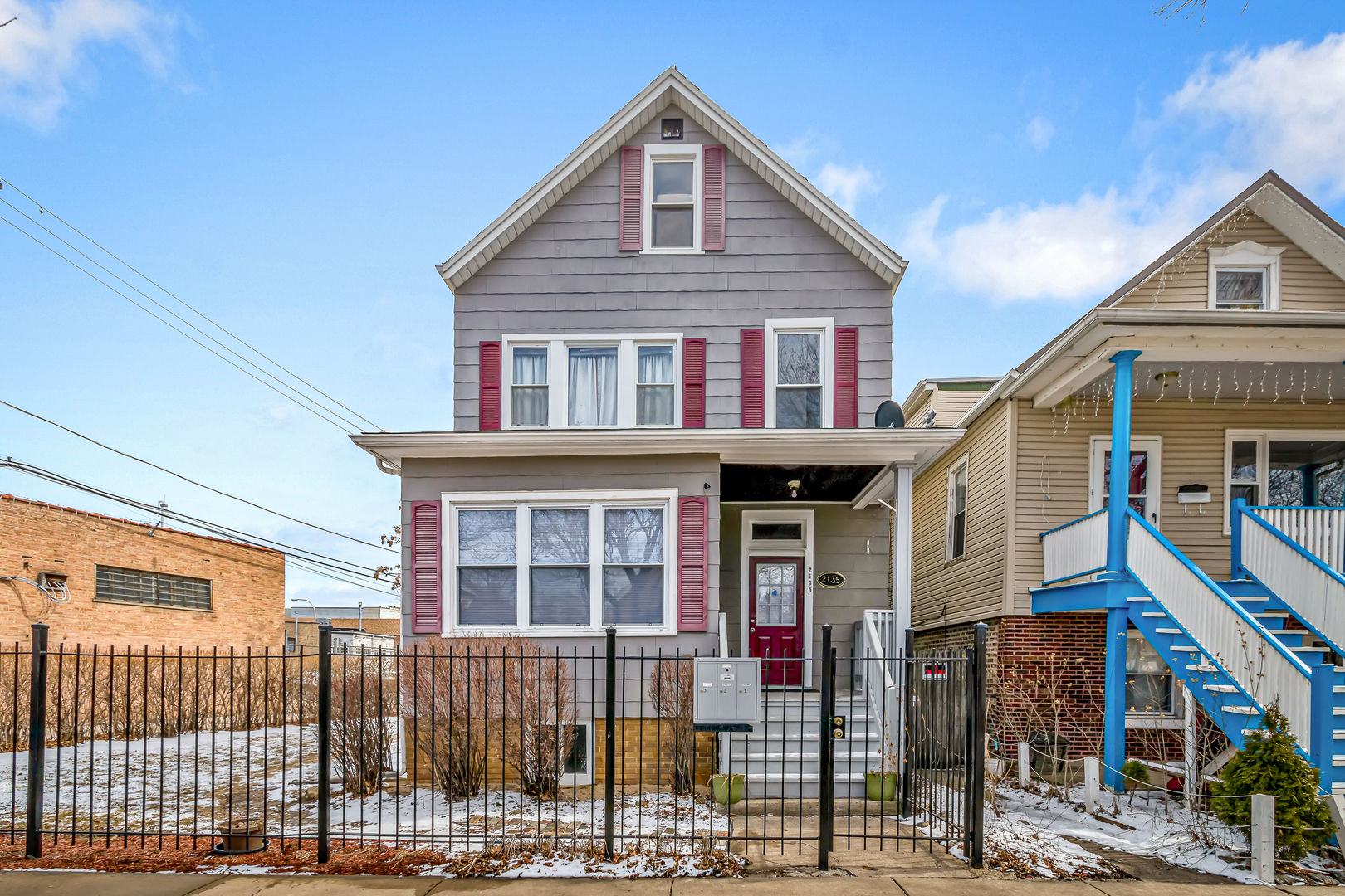 2135 North Menard Avenue, Unit 3 Chicago, IL 60639 - Photo 1 of 12 a front view of a house